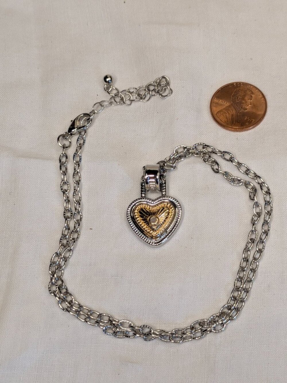 Diamonds International Two‑Tone Heart Necklace – Silver and Gold Accent with Gem